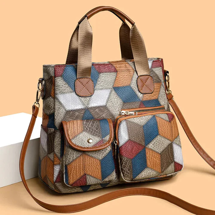 Bolso de mano de piel con mosaico